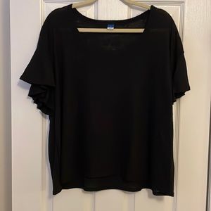 Black (lightly see through) top with flowy sleeves